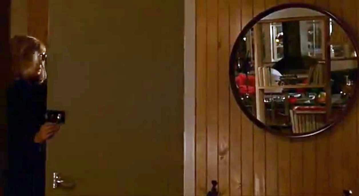 Figure 24: Convex mirror in Modesty Blasie. Modesty (Monica Vitti), at far left, breaks into Paul Hagan’s (Michael Craig) flat.
